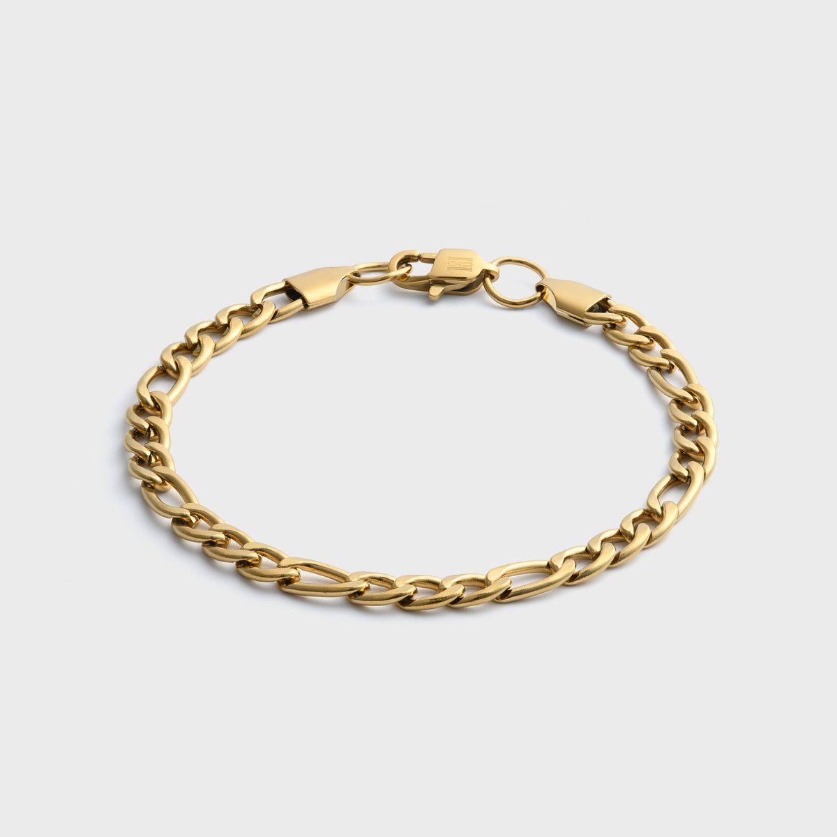 5mm Gold Figaro Bracelet Front Shot on light grey background
