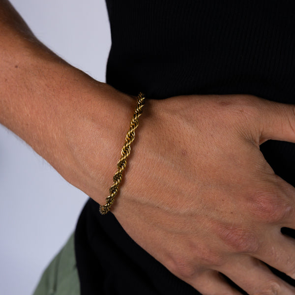 5mm gold rope chain bracelet worn on the wrist, close-up view