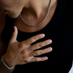5mm silver rope chain bracelet worn on the wrist, close-up view