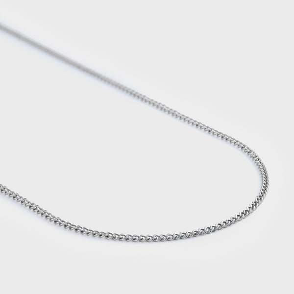 Curb chain silver 2mm side shot on grey background