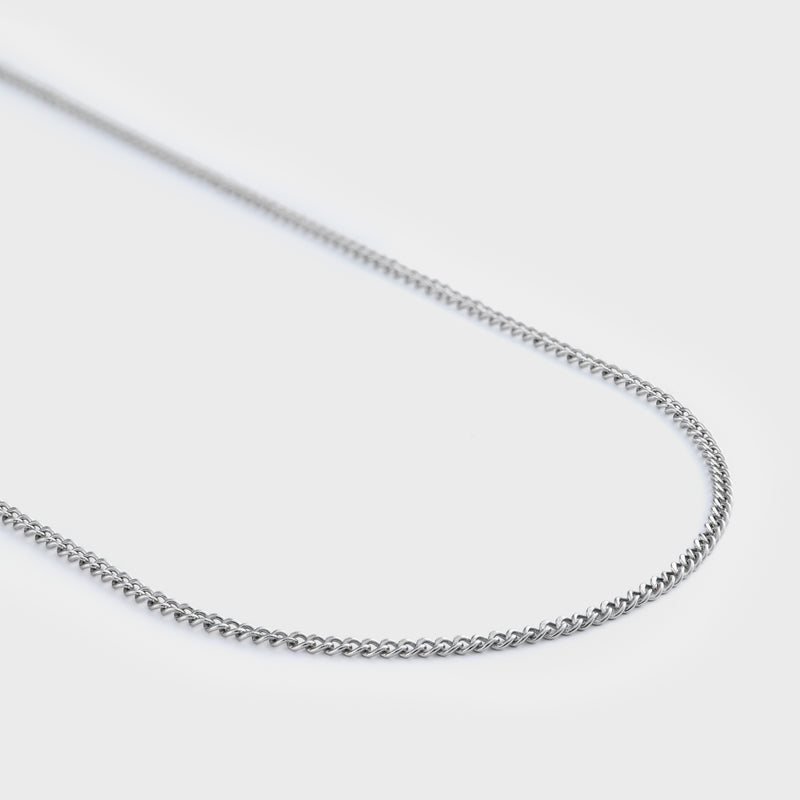 Curb chain silver 2mm side shot on grey background