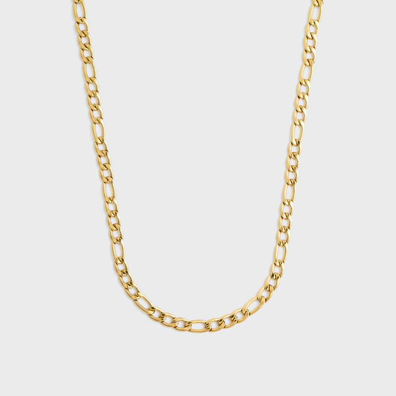 Figaro chain gold 5mm top shot on light grey background