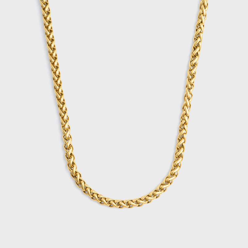 Wheat chain gold 5mm top shot on light grey background